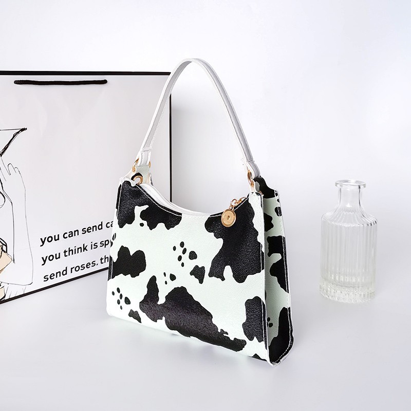 cow print mini purse